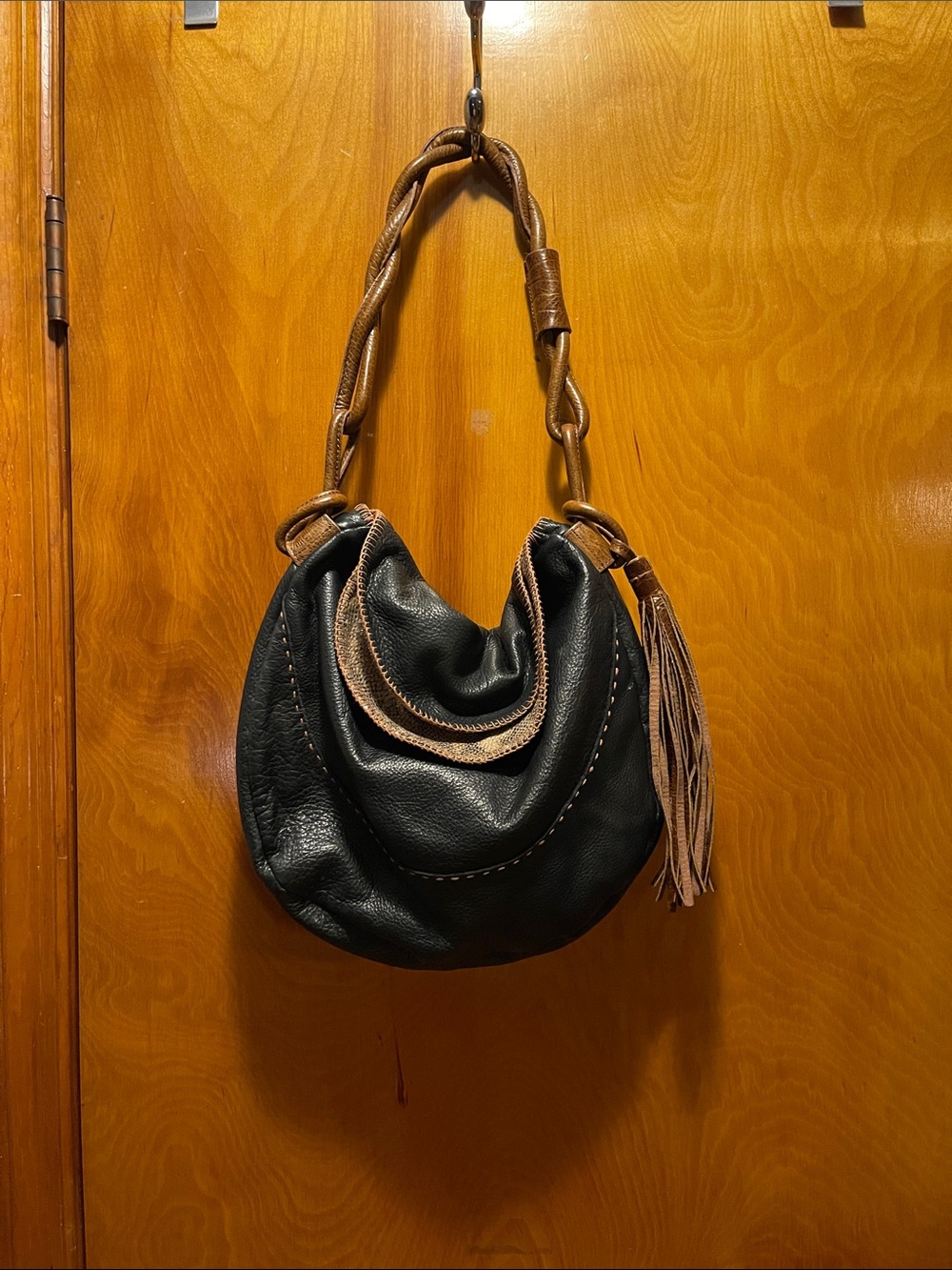Black Hobo Bag with Brown Braided Strap and Tassel